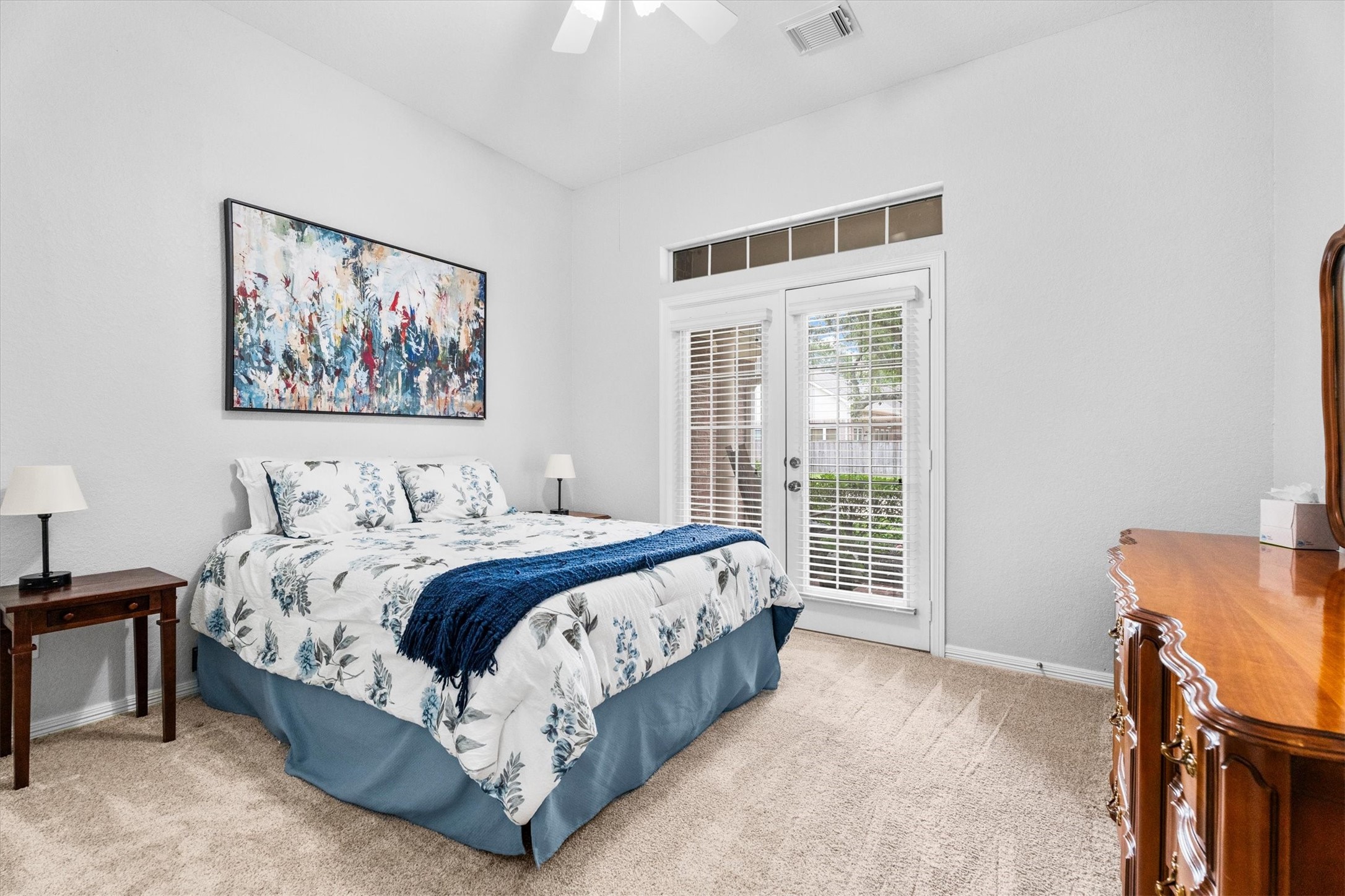 9406 Lochflora Drive Spring, TX 77379 - Photo 11 of 49 a bedroom with a bed and a window