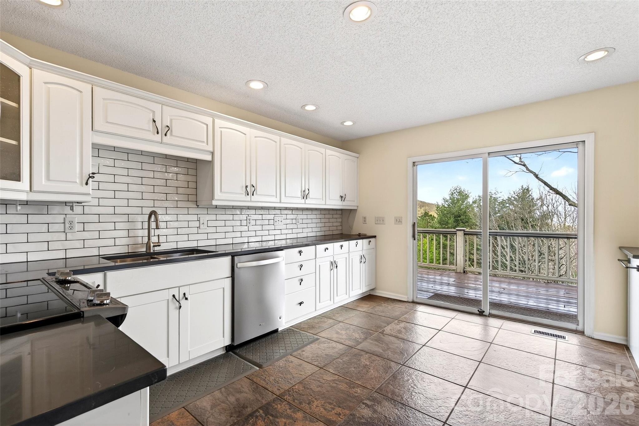 3 Tree Top Place Black Mountain, NC 28711 - Photo 14 of 43 a large kitchen with a large window
