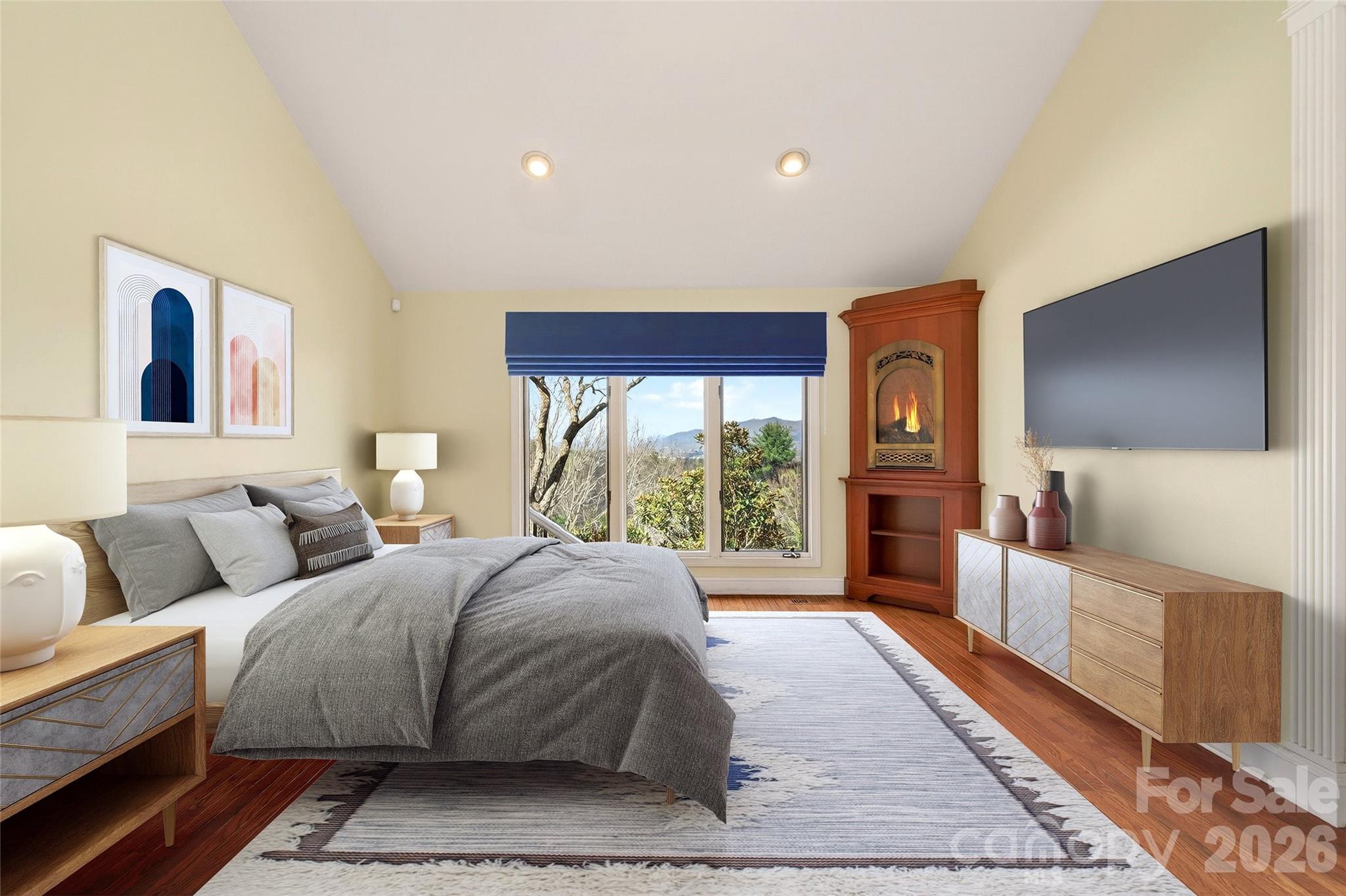 3 Tree Top Place Black Mountain, NC 28711 - Photo 24 of 43 a spacious bedroom with a large bed and a flat screen tv