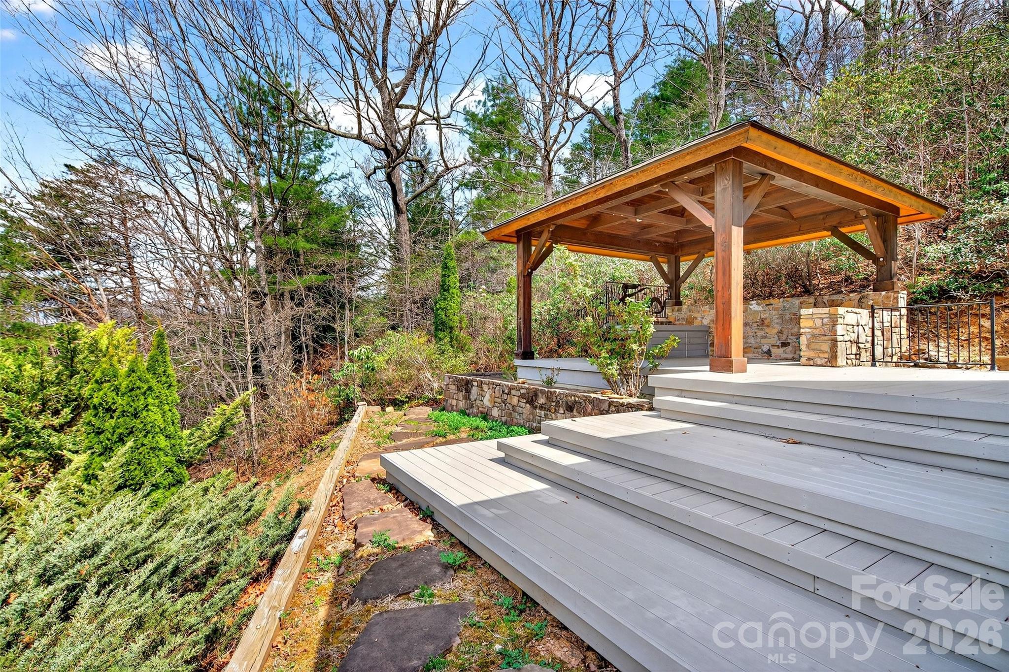 3 Tree Top Place Black Mountain, NC 28711 - Photo 29 of 43 a backyard of a house with yard and outdoor seating