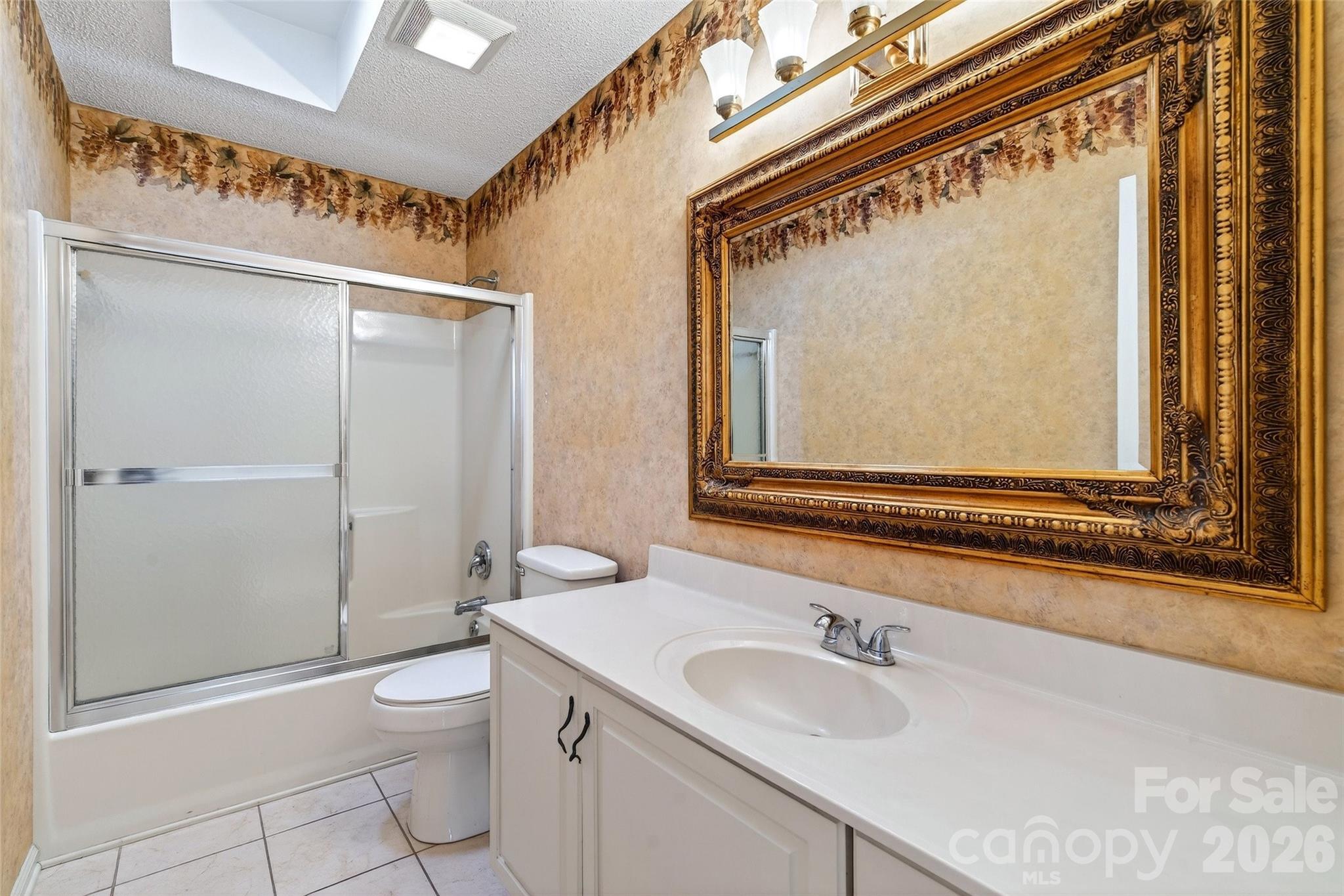 3 Tree Top Place Black Mountain, NC 28711 - Photo 42 of 43 a bathroom with a granite countertop sink mirror vanity and toilet