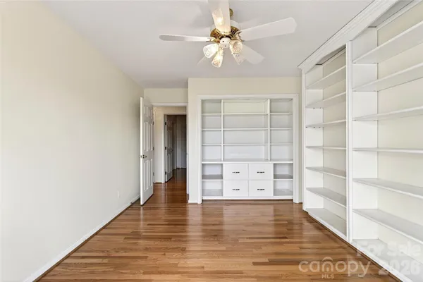 a view of a room with racks on the wall