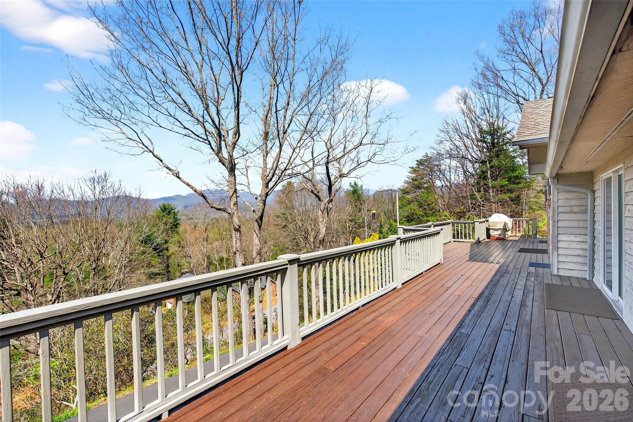 3 Tree Top Place Black Mountain, NC 28711 - Photo 5 of 43 a view of balcony with wooden floor and fence