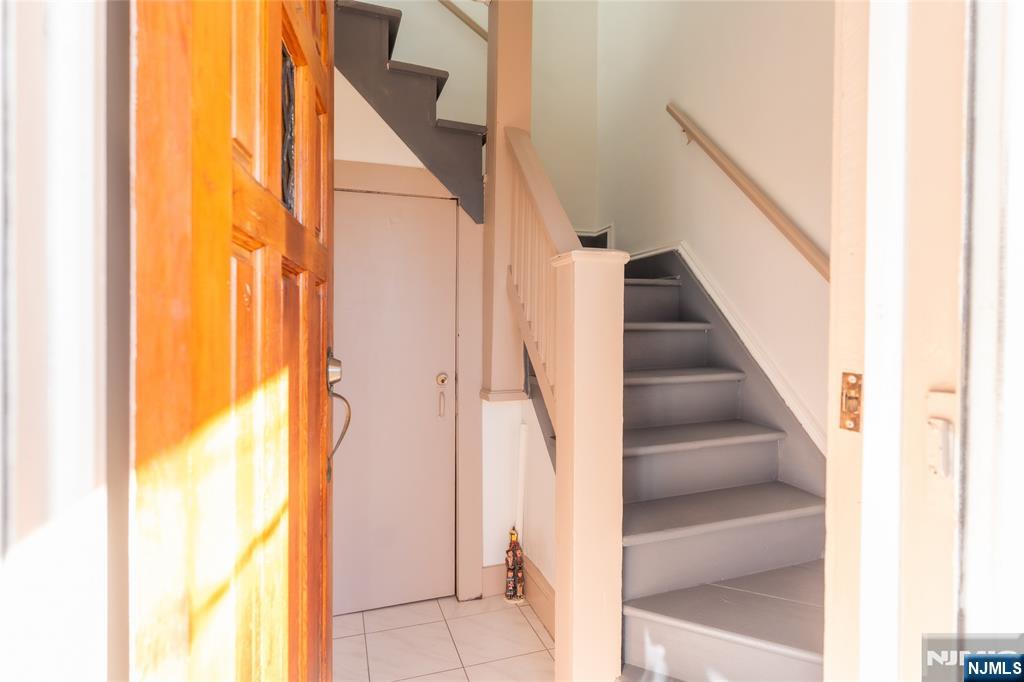 125 Clark Place, Unit 123 Elizabeth, NJ 07206 - Photo 16 of 16 a view of staircase with large window