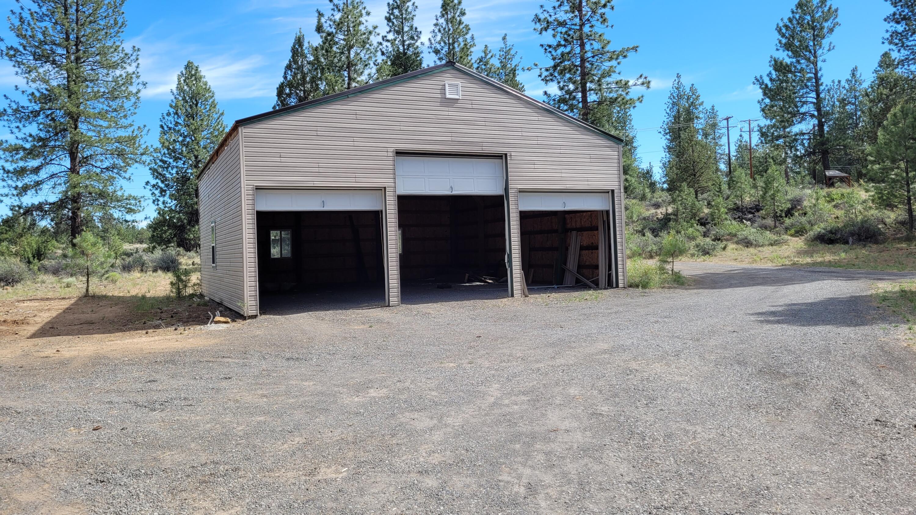19724 Buck Canyon Road Bend, OR 97702 - Photo 2 of 38 Huge 3 bay shop.