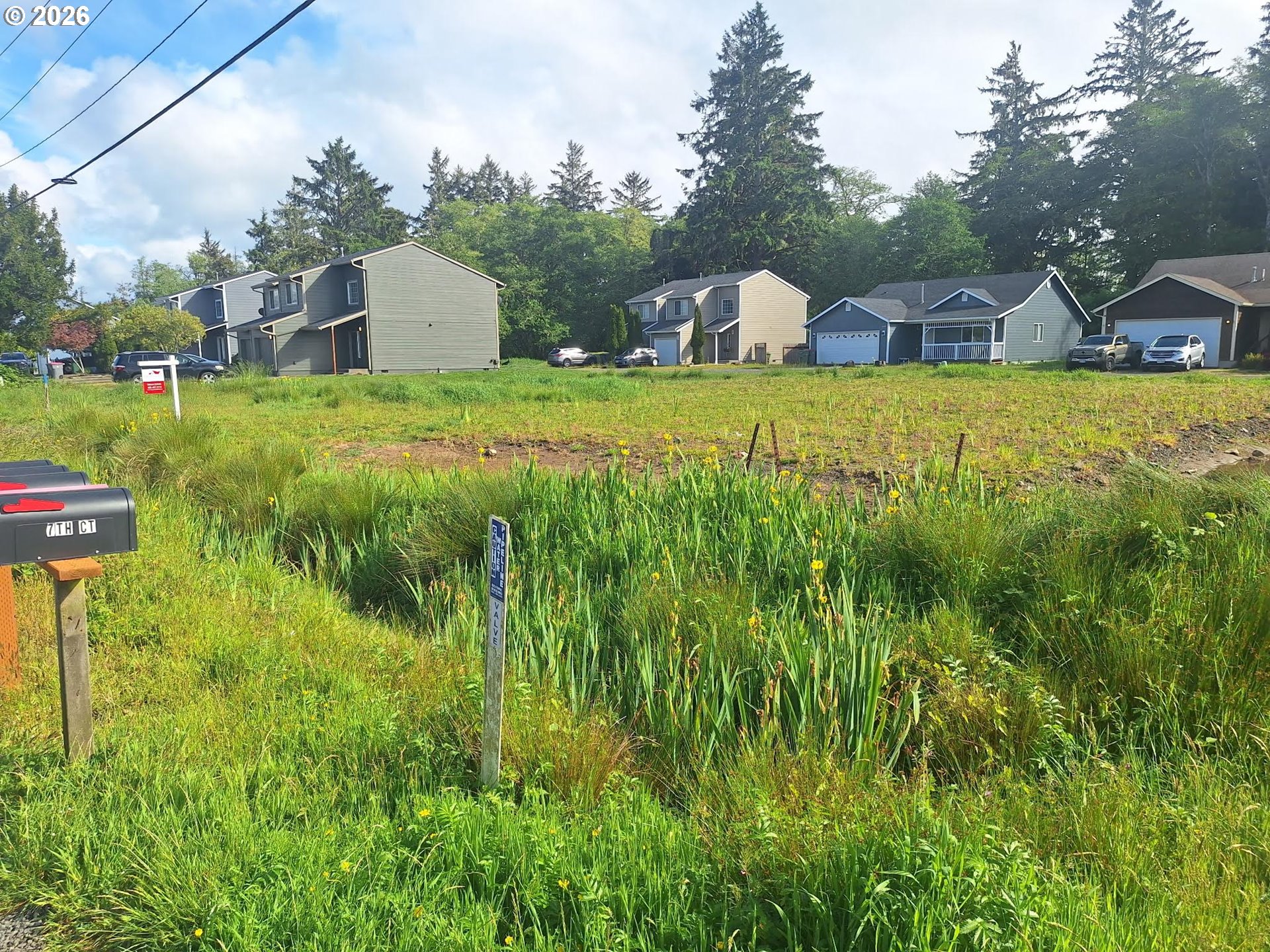 590 7th Avenue Hammond, OR 97121 - Photo 20 of 20 a view of a house with a swimming pool