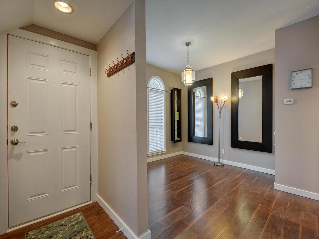 2529 Rio Grande Street, Unit 58 Austin, TX 78705 - Photo 4 of 23 a view of a room with wooden floor and staircase