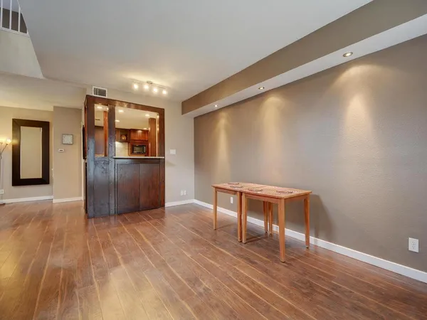 a view of a livingroom with wooden floor