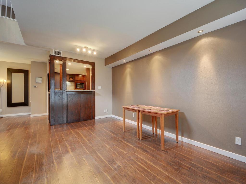 2529 Rio Grande Street, Unit 58 Austin, TX 78705 - Photo 7 of 23 a view of a livingroom with wooden floor