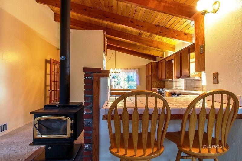 25020 Rim Rock Road Idyllwild, CA 92549 - Photo 12 of 34 a view of living room kitchen and entryway