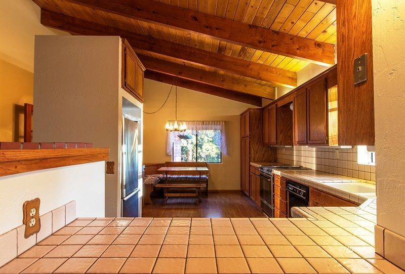 25020 Rim Rock Road Idyllwild, CA 92549 - Photo 13 of 34 a view of a kitchen with electric appliances