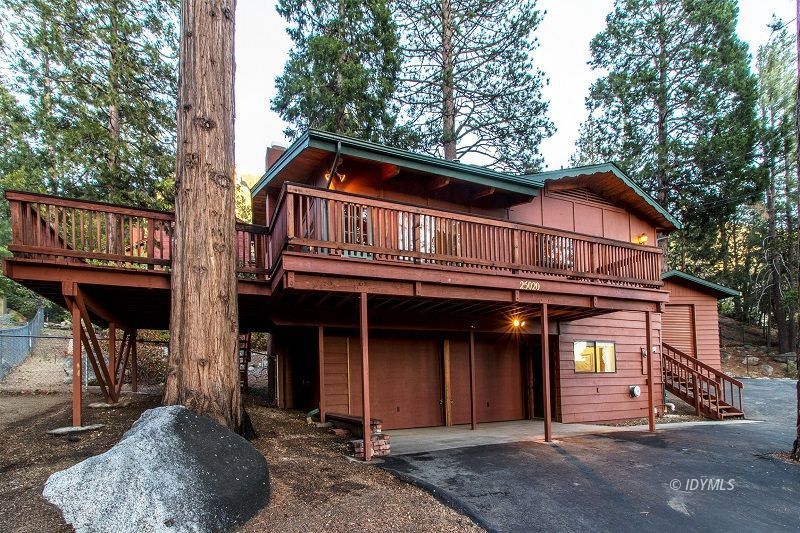 25020 Rim Rock Road Idyllwild, CA 92549 - Photo 2 of 34 a front view of a house