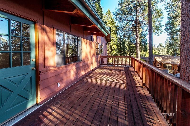 25020 Rim Rock Road Idyllwild, CA 92549 - Photo 5 of 34 a view of balcony with wooden floor and fence