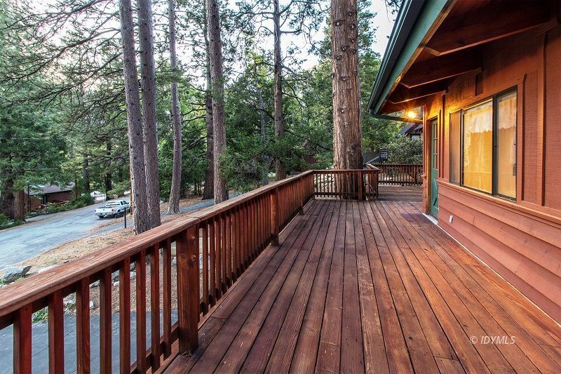 25020 Rim Rock Road Idyllwild, CA 92549 - Photo 6 of 34 a view of balcony with deck and wooden floor