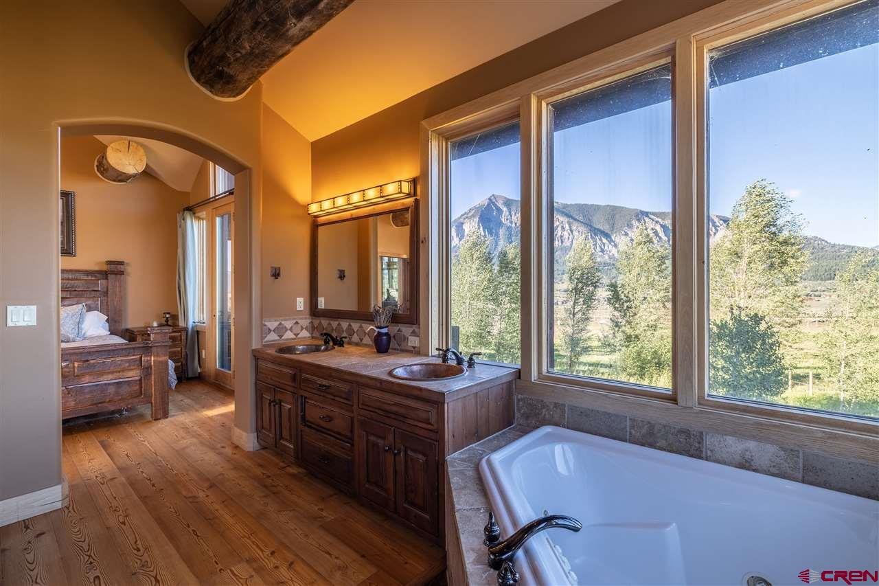 379 Smith Road Crested Butte, CO 81224 - Photo 20 of 35 a very nice looking room with a large window and furniture