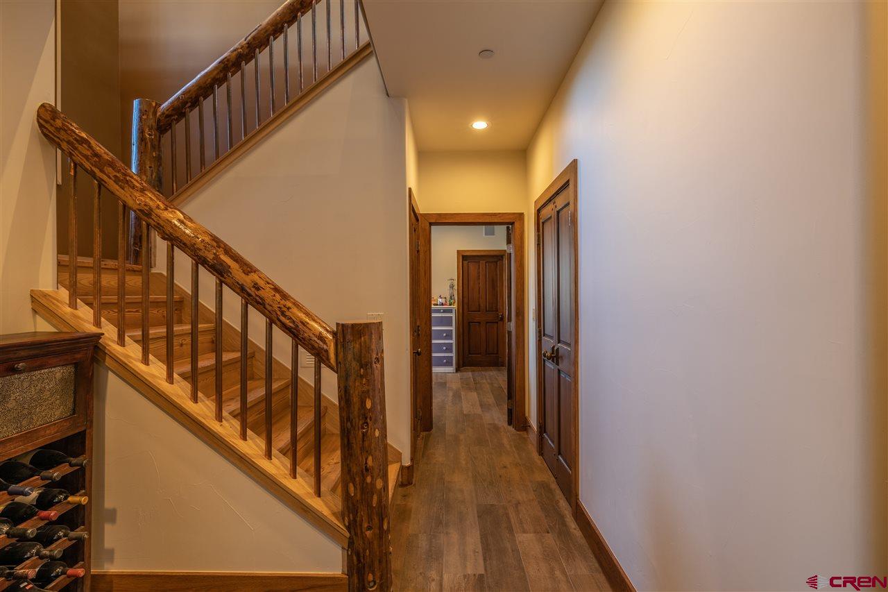379 Smith Road Crested Butte, CO 81224 - Photo 22 of 35 a view of stairs and with wooden floor