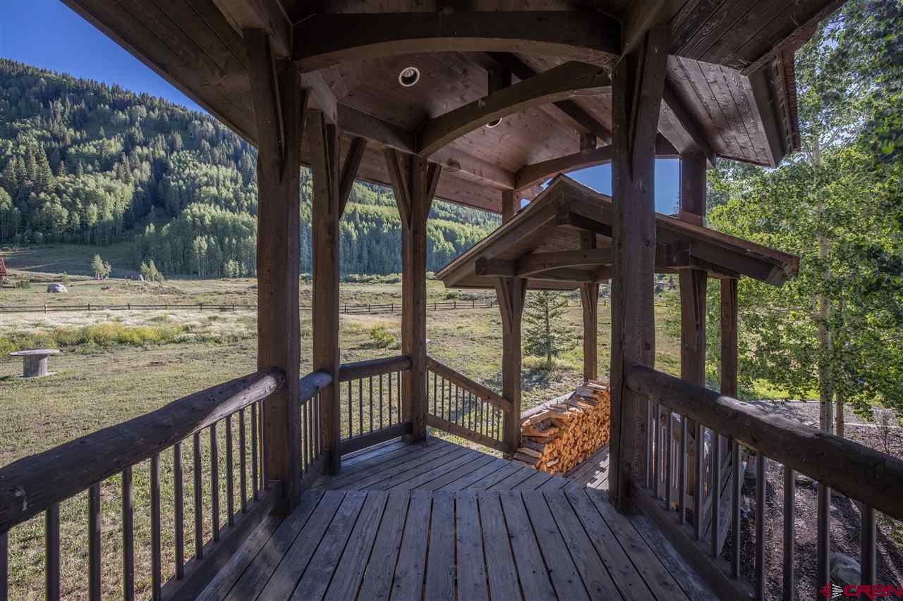 379 Smith Road Crested Butte, CO 81224 - Photo 31 of 35 a view of a balcony with wooden floor