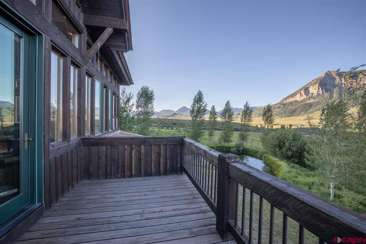 379 Smith Road Crested Butte, CO 81224 - Photo 33 of 35 a view of a balcony with wooden floor