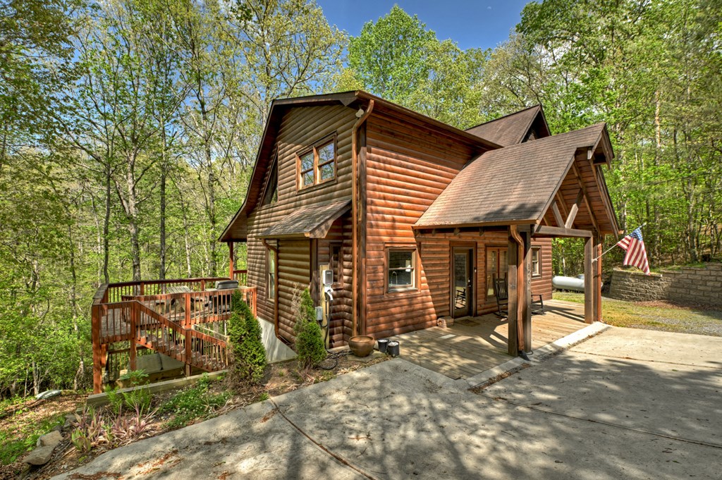 126 Brookwood Drive Blue Ridge, GA 30513 - Photo 85 of 106 a view of a house with a yard