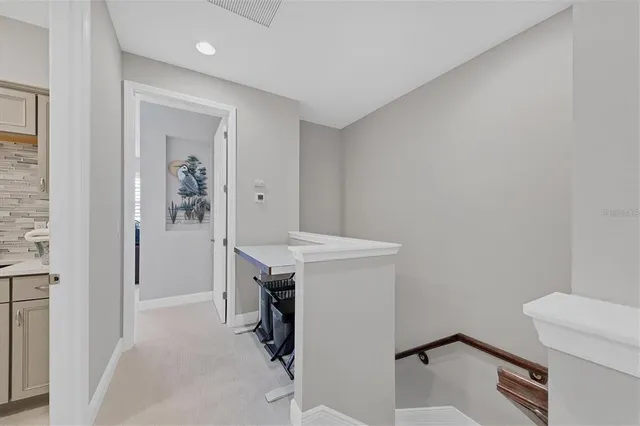 a bathroom with a double vanity sink mirror and shower