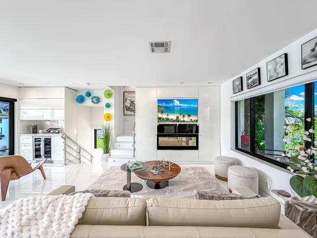 a kitchen with a sink and a refrigerator