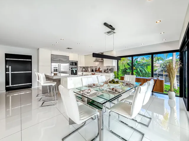 a view of a house with a yard porch and sitting area