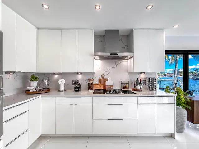 a outdoor space with patio lots of furniture and umbrellas