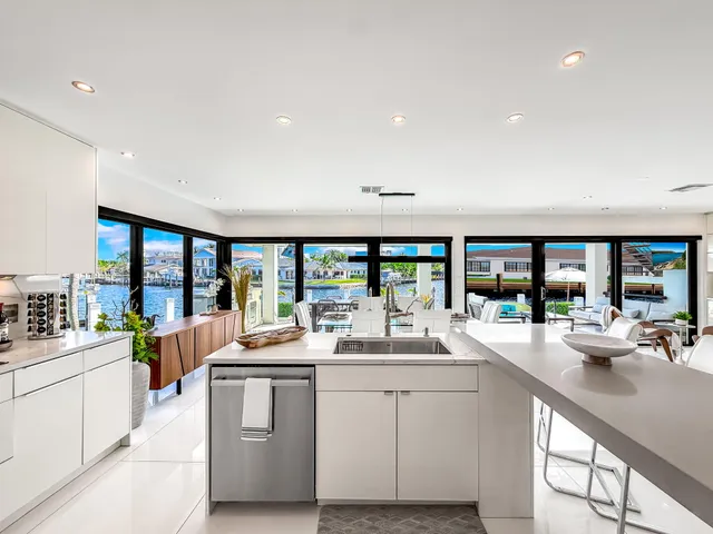 a view of a chairs and table in patio