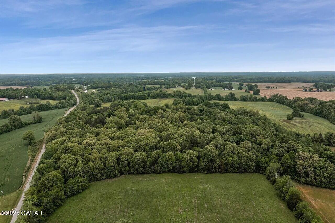 105 Booth Road Trenton, TN 38382 - Photo 4 of 21 an aerial view of a houses with a yard
