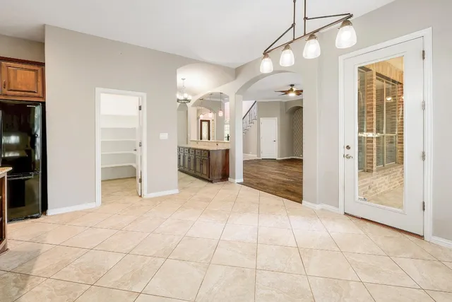 a view of an entryway with a chandelier