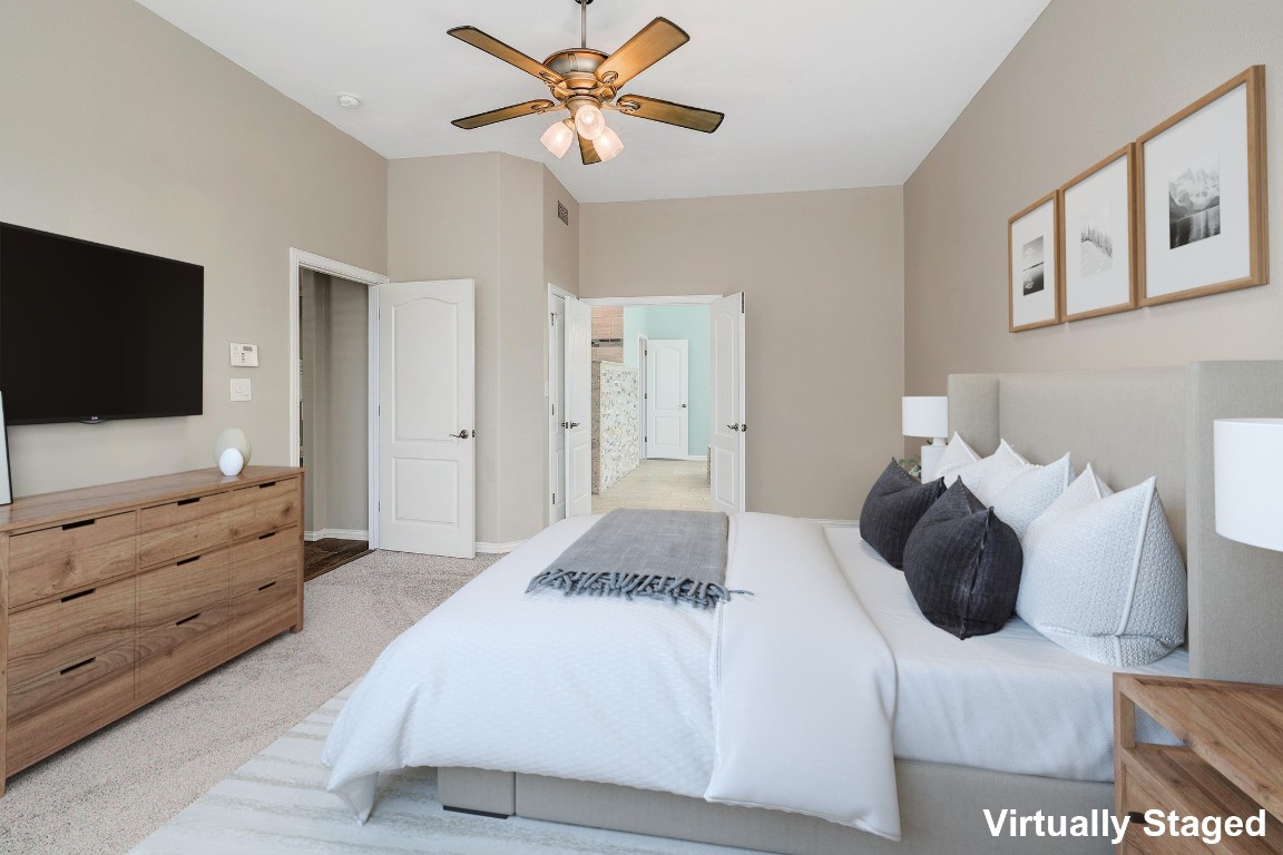 1900 Alamo Bound Leander, TX 78641 - Photo 19 of 38 a bedroom with a bed and a flat screen tv