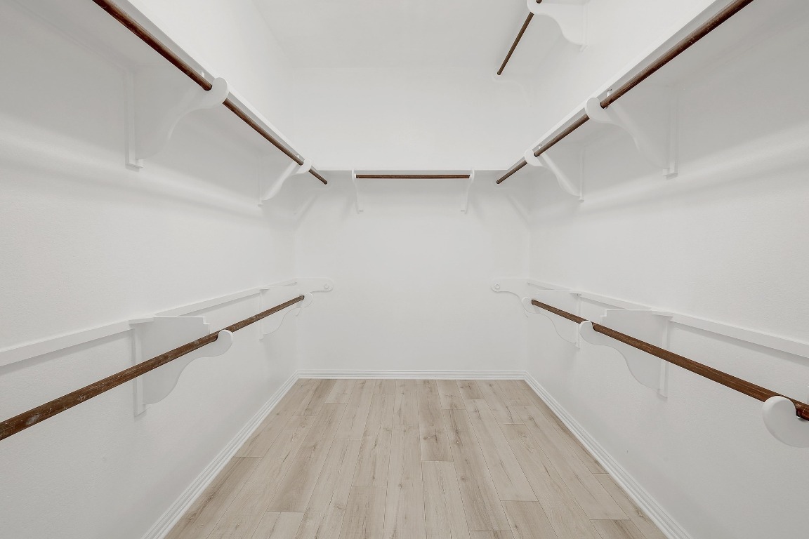 1900 Alamo Bound Leander, TX 78641 - Photo 22 of 38 a view of a room with wooden floor
