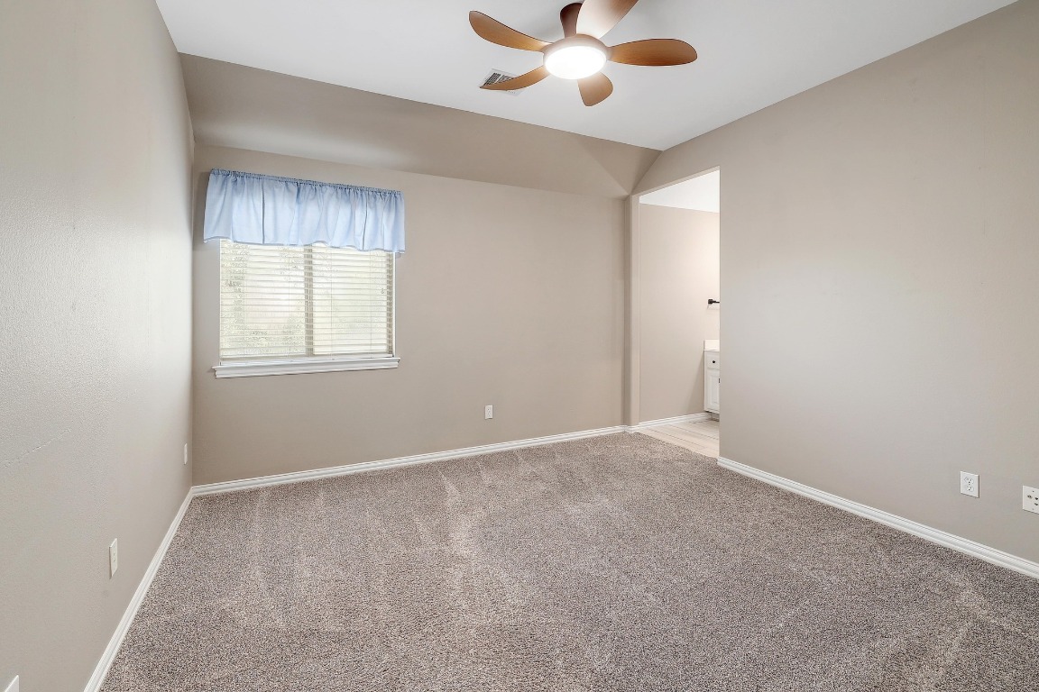 1900 Alamo Bound Leander, TX 78641 - Photo 28 of 38 an empty room with windows and fan