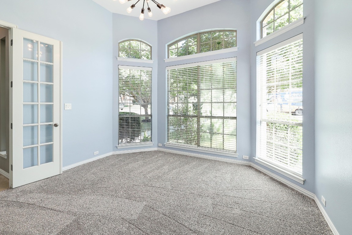 1900 Alamo Bound Leander, TX 78641 - Photo 6 of 38 a view of an empty room with a window