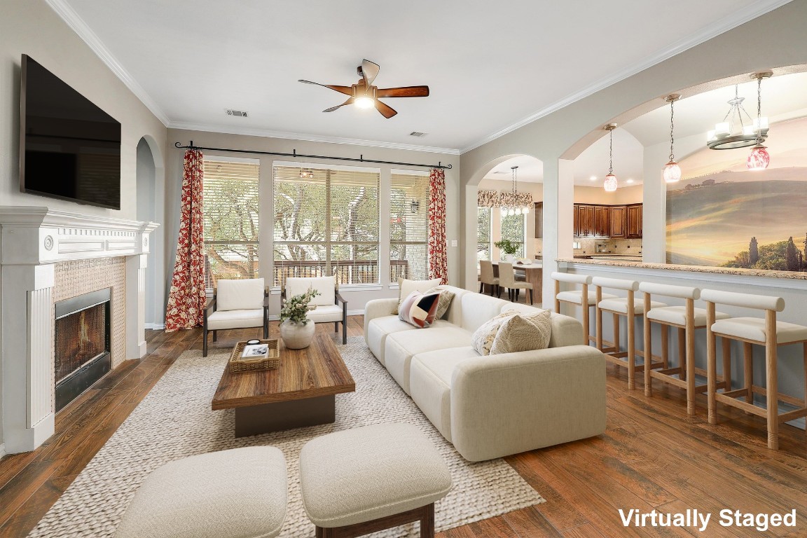 1900 Alamo Bound Leander, TX 78641 - Photo 10 of 38 a living room with furniture fireplace and a flat screen tv