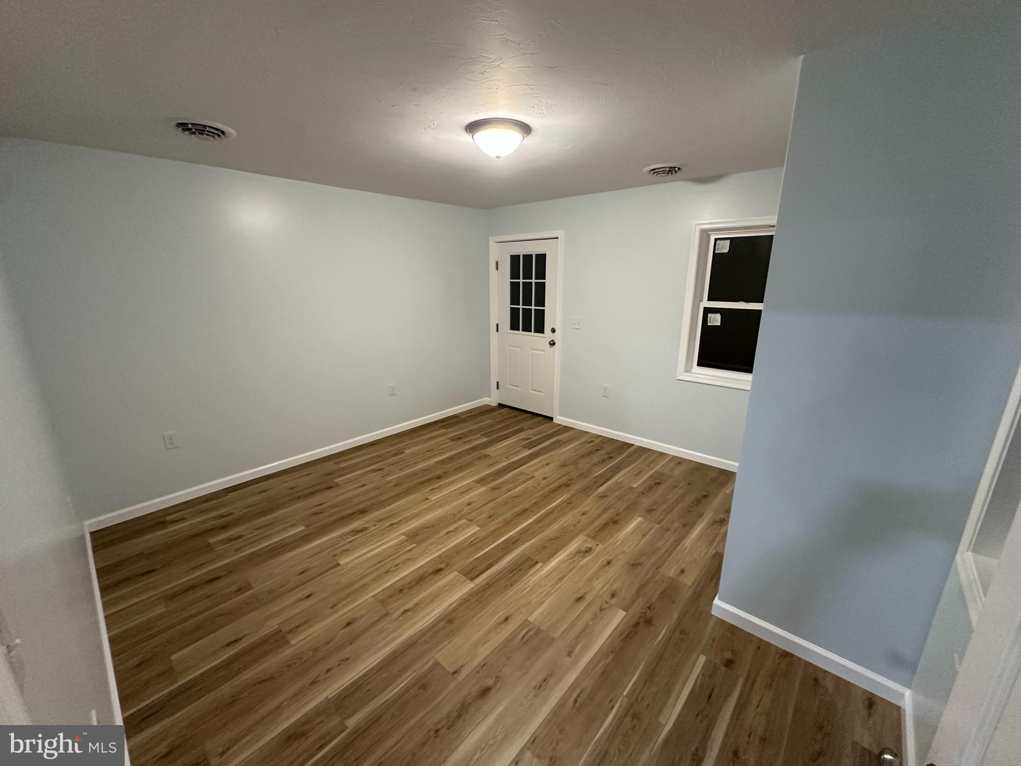40 Mt Hope Road Fairfield, PA 17320 - Photo 11 of 13 a view of room with wooden floor and window