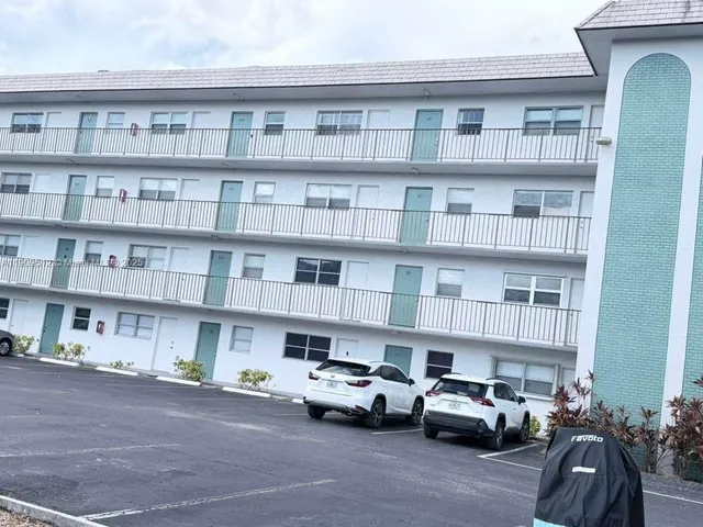 a cars parked in front of a building
