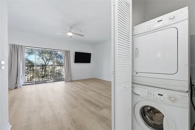 a view of a kitchen with washer and dryer