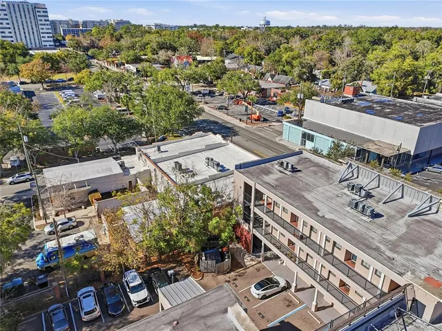 an aerial view of a city with lots of residential buildings