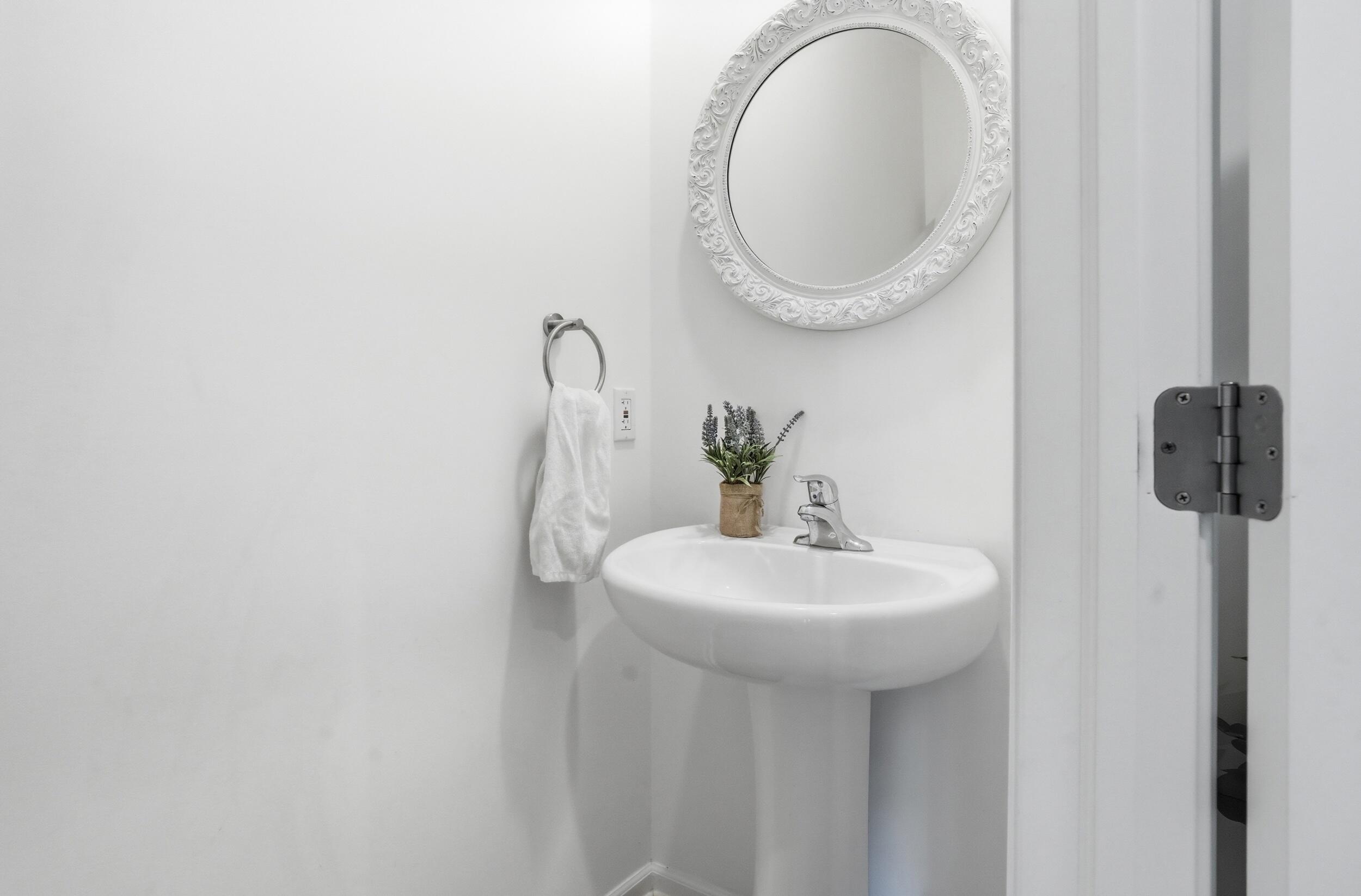 8658 Valley Forge Way Lowell, IN 46356 - Photo 12 of 23 a bathroom with a sink and a mirror
