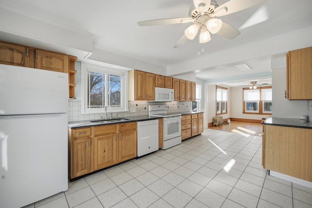 88 Verdugo Street West Springfield, MA 01089 - Photo 16 of 42 a large kitchen with a cabinets and outdoor space