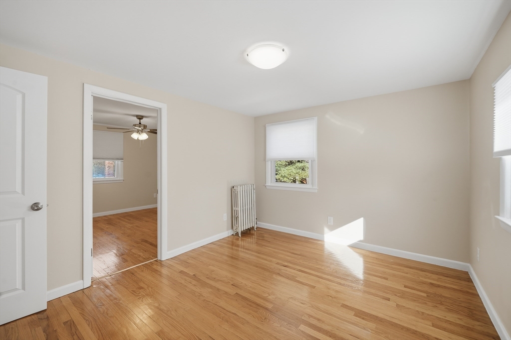 88 Verdugo Street West Springfield, MA 01089 - Photo 23 of 42 a view of empty room with wooden floor and fan