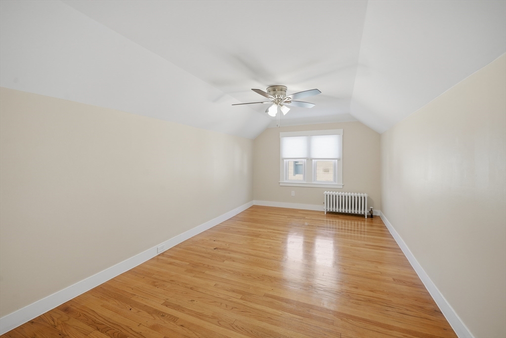88 Verdugo Street West Springfield, MA 01089 - Photo 28 of 42 a view of an empty room with wooden floor and a window