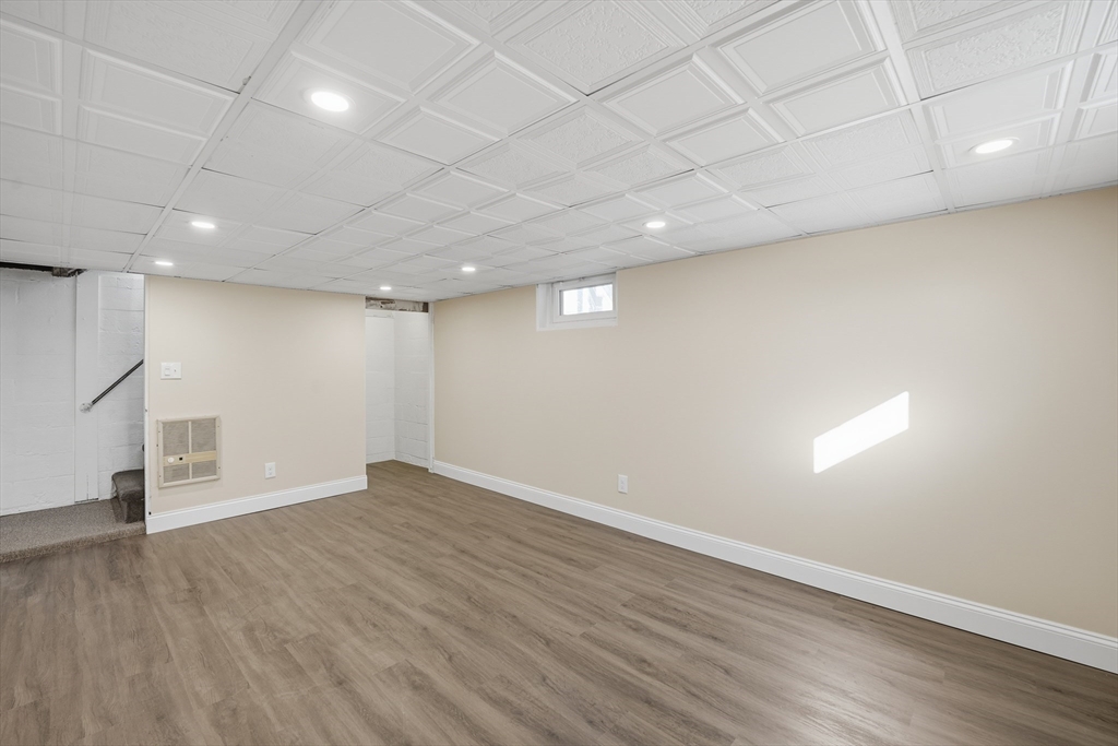 88 Verdugo Street West Springfield, MA 01089 - Photo 31 of 42 an empty room with wooden floor and windows