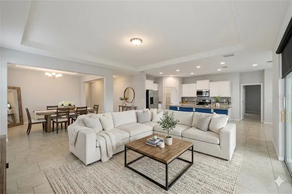 a living room with furniture and a table