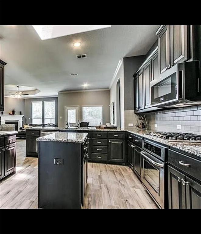 3905 Gennaker Drive Denton, TX 76210 - Photo 3 of 13 a kitchen with lots of counter top space