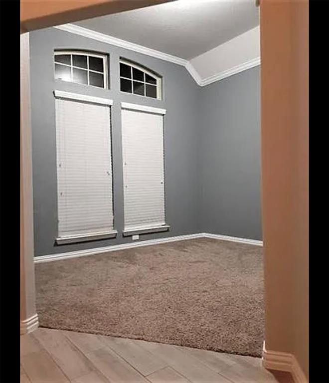 3905 Gennaker Drive Denton, TX 76210 - Photo 8 of 13 a view of an empty room with windows