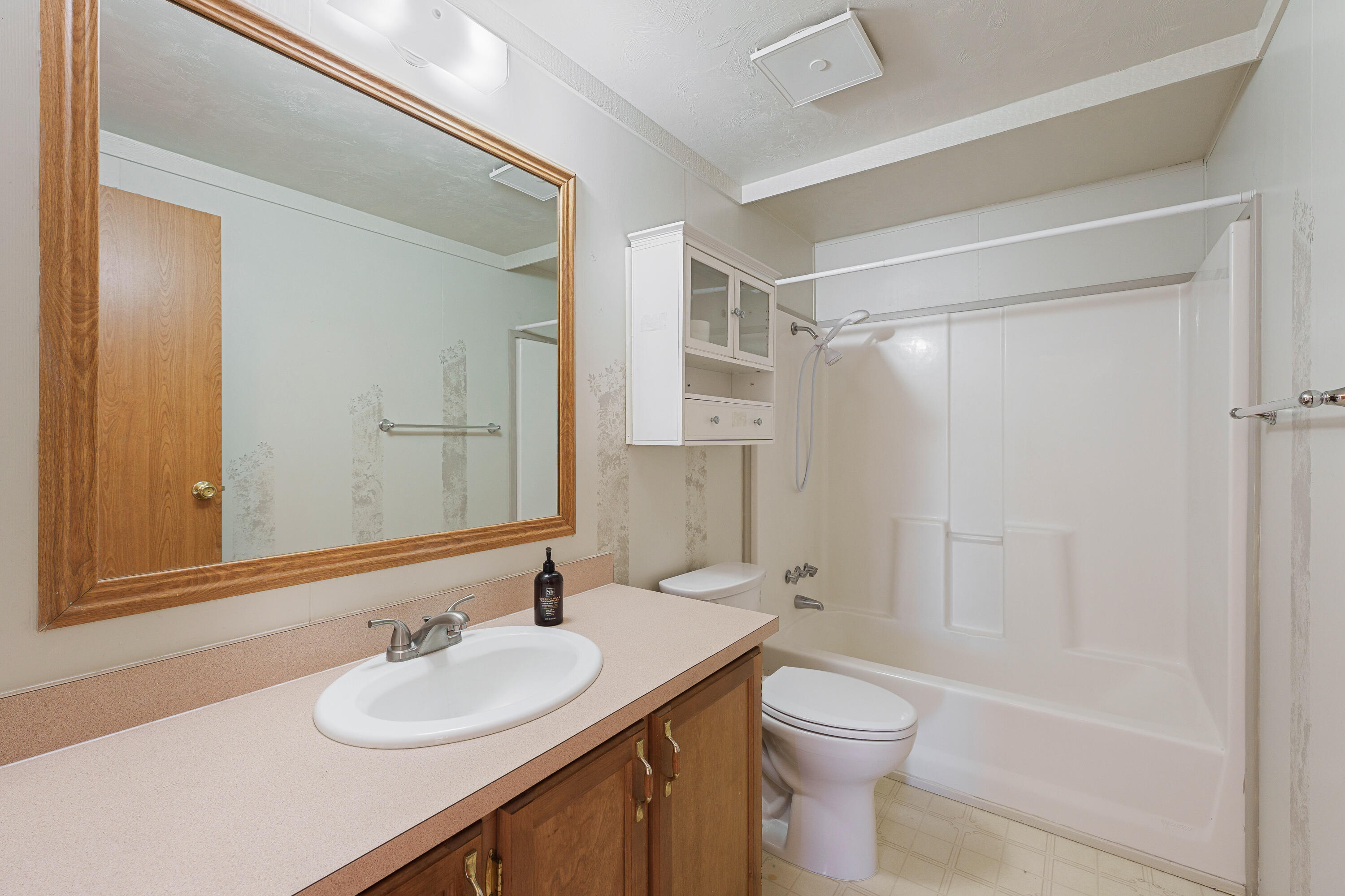 5674 Southeast Davis Loop Prineville, OR 97754 - Photo 23 of 48 a bathroom with a sink a toilet and shower