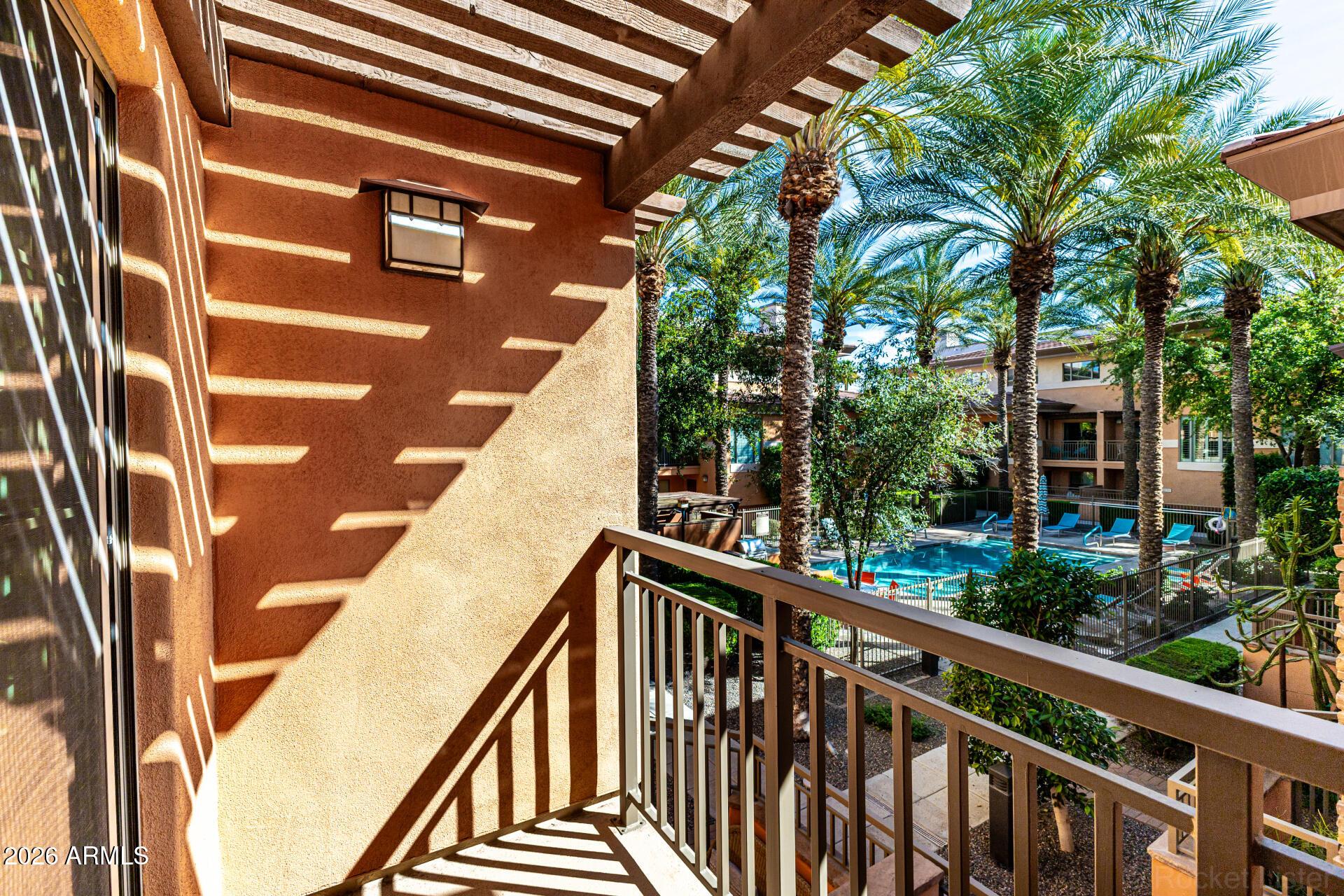 6940 East Cochise Road, Unit 1043 Paradise Valley, AZ 85253 - Photo 28 of 35 a view of a balcony with a tree
