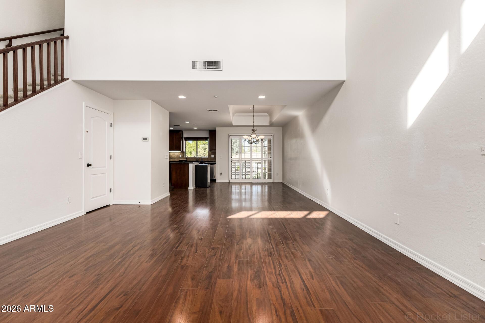6940 East Cochise Road, Unit 1043 Paradise Valley, AZ 85253 - Photo 7 of 35 a view of empty room with wooden floor